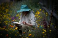 Photo of a woman painting