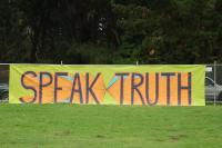 Photo of banner: Speak Truth