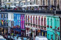 A photograph of colourful houses on a street in Edinburgh