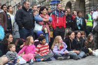 Crowd watching street theatre