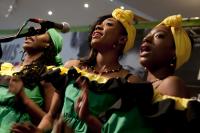 Photo of three women singing