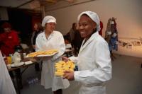 Photo of volunteers with biscuits