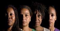 Photo of four female performers in Snakes and Ladders