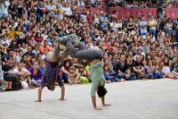 Photo of two men doing acrobatics