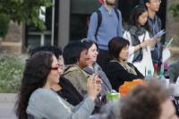 Photo of audience watching performance