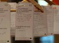 Photo of luggage tags with writing