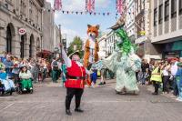 Street Fest in Gloucester on 1 July 2023. Giant puppet Farrah the Fox parades the streets with Sabrina, a puppet representing the Spirit of the River Severn, created in partnership with Emergency Exit Arts. 