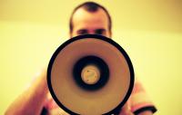 Photo of man with megaphone