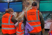 Community volunteers in hi viz tabards