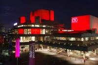 Exterior of National Theatre with lights on