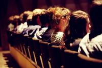 Photo of people sitting in cinema seats