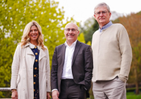 L-R Candice Pearson, Fred Moroni, and Nic Lloyd stand in front of trees