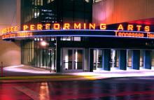 Photo of exterior of theatre at night