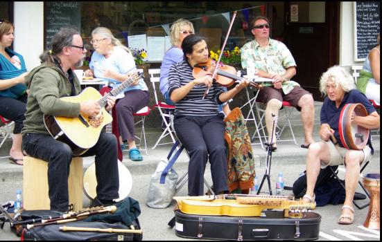 Photo of musicians playing on the street