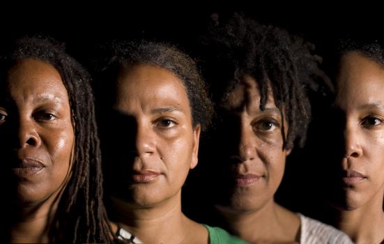 Photo of four female performers in Snakes and Ladders