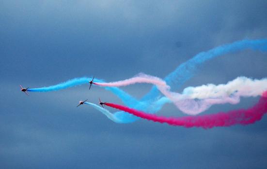 Photo of aeroplanes trailing coloured smoke