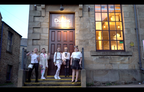 Five young Traveller girls outside the front door of the dukes lancaster