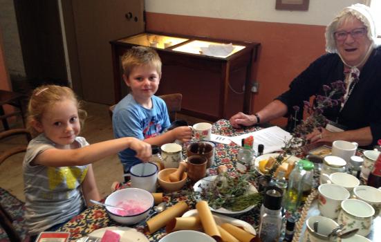 Photo of children at table in museum