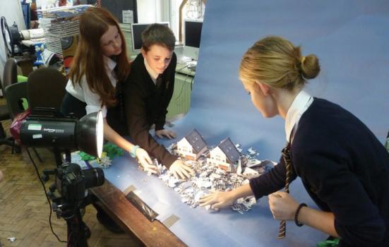 Image of children creating village scene in the classroom