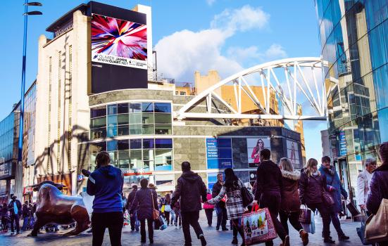 Photo of a full motion screen in Birmingham with Olivier's artwork on