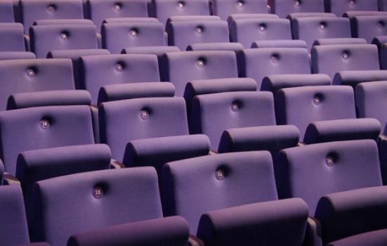 Photo of purple auditorium seats