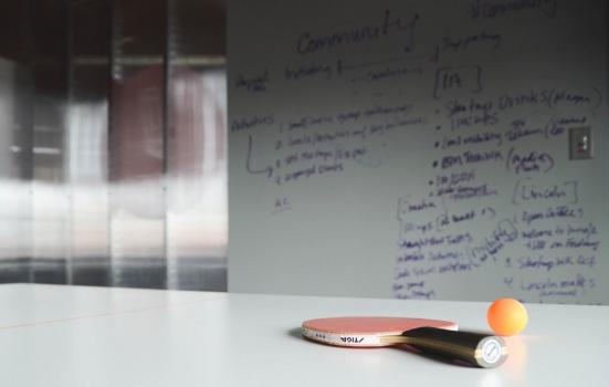 Photo of ping-pong bat in meeting room