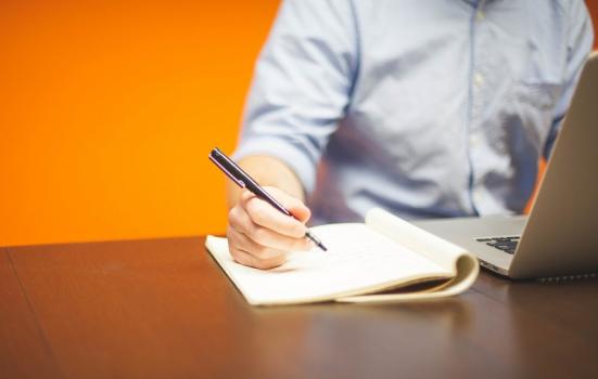 Photo of man with laptop