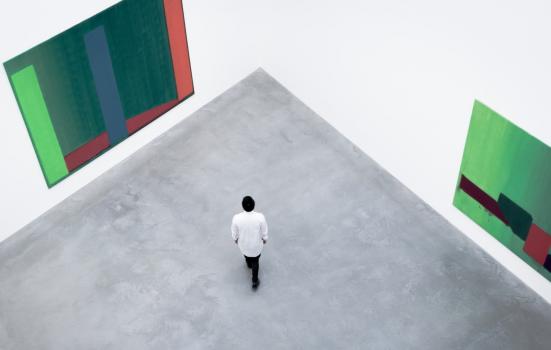 Photo of man in empty gallery