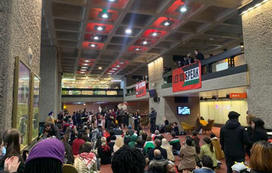 Protesters inside the Barbican Centre