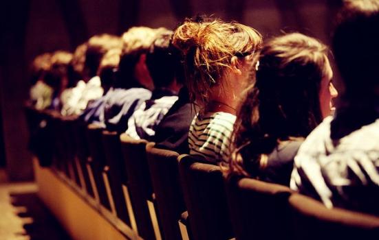 Photo of people sitting in cinema seats