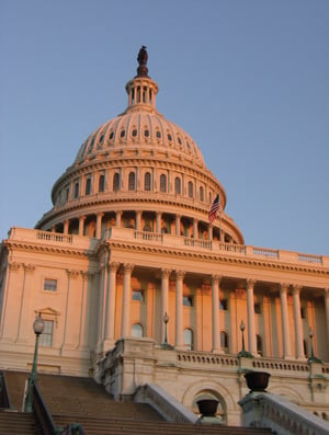 A large white building with a dome