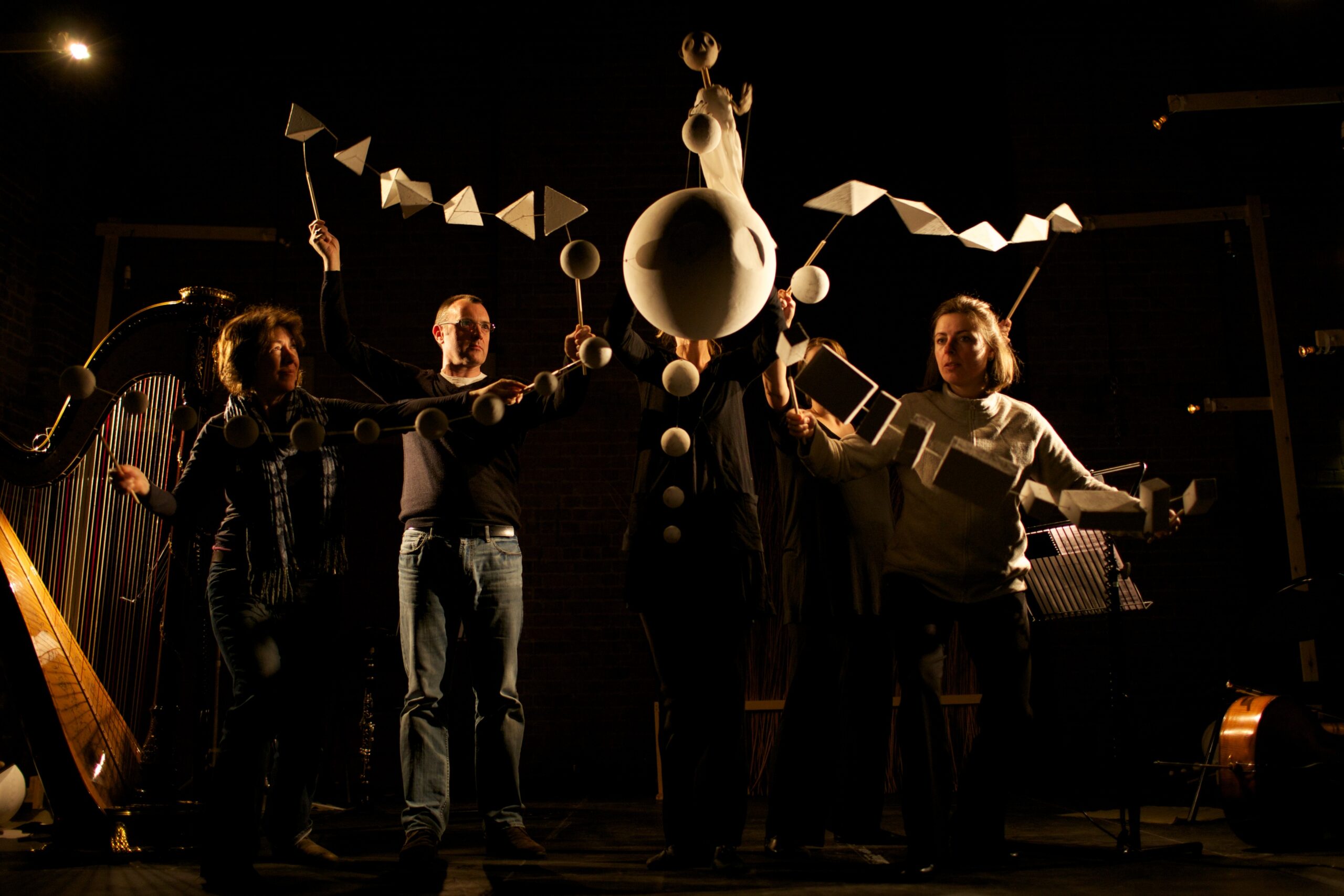 Picture shows puppeteers in a performance of 'Half of Me'