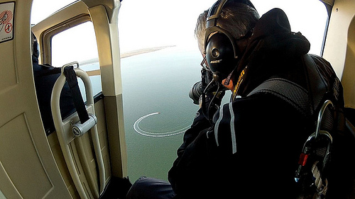 Image of photographer in plane