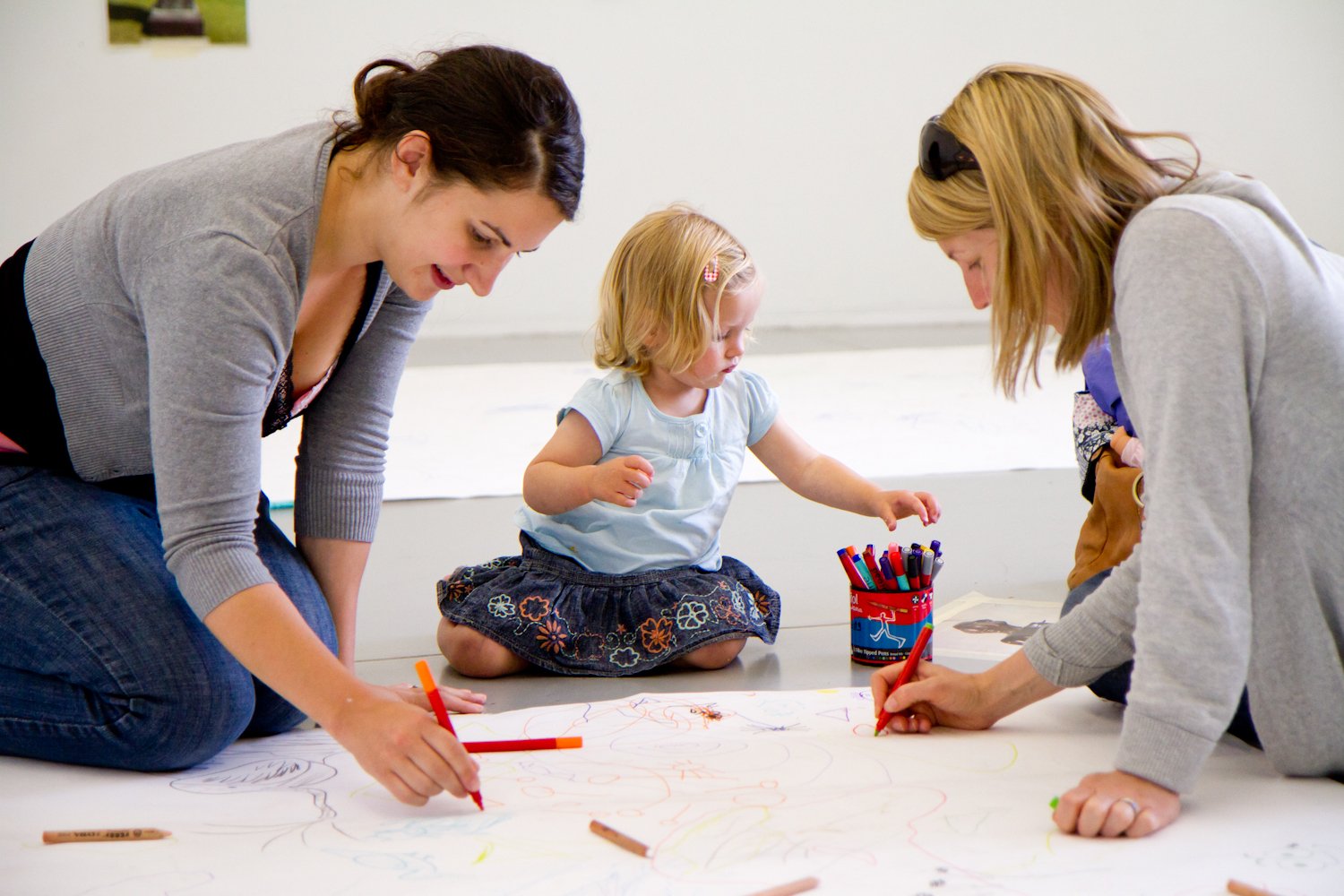 Image of students and child