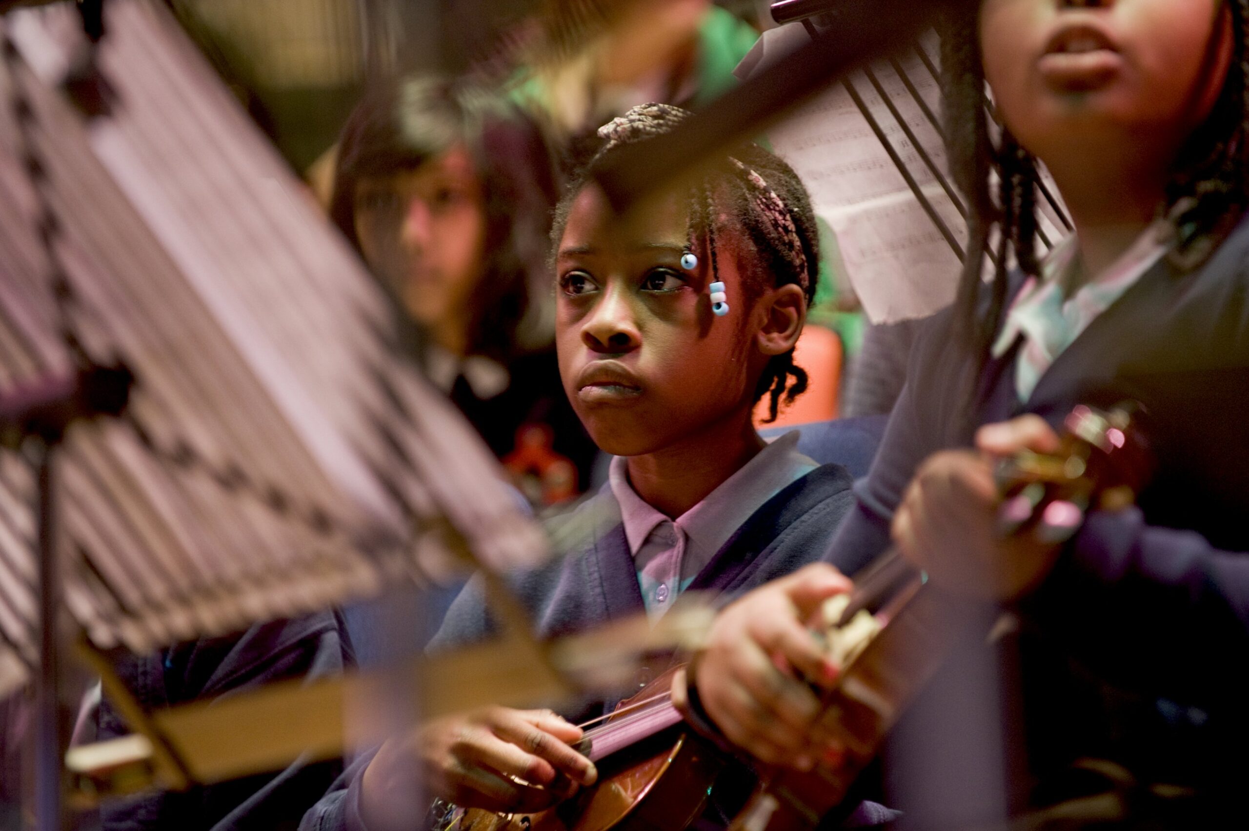 Photo of girls playing in orchestra