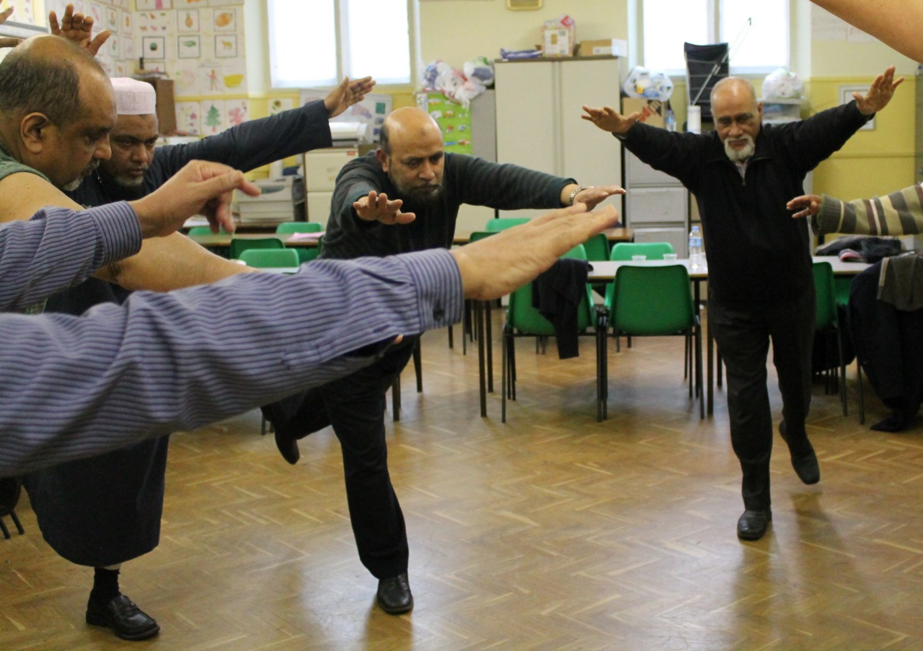 Photo of men dancing