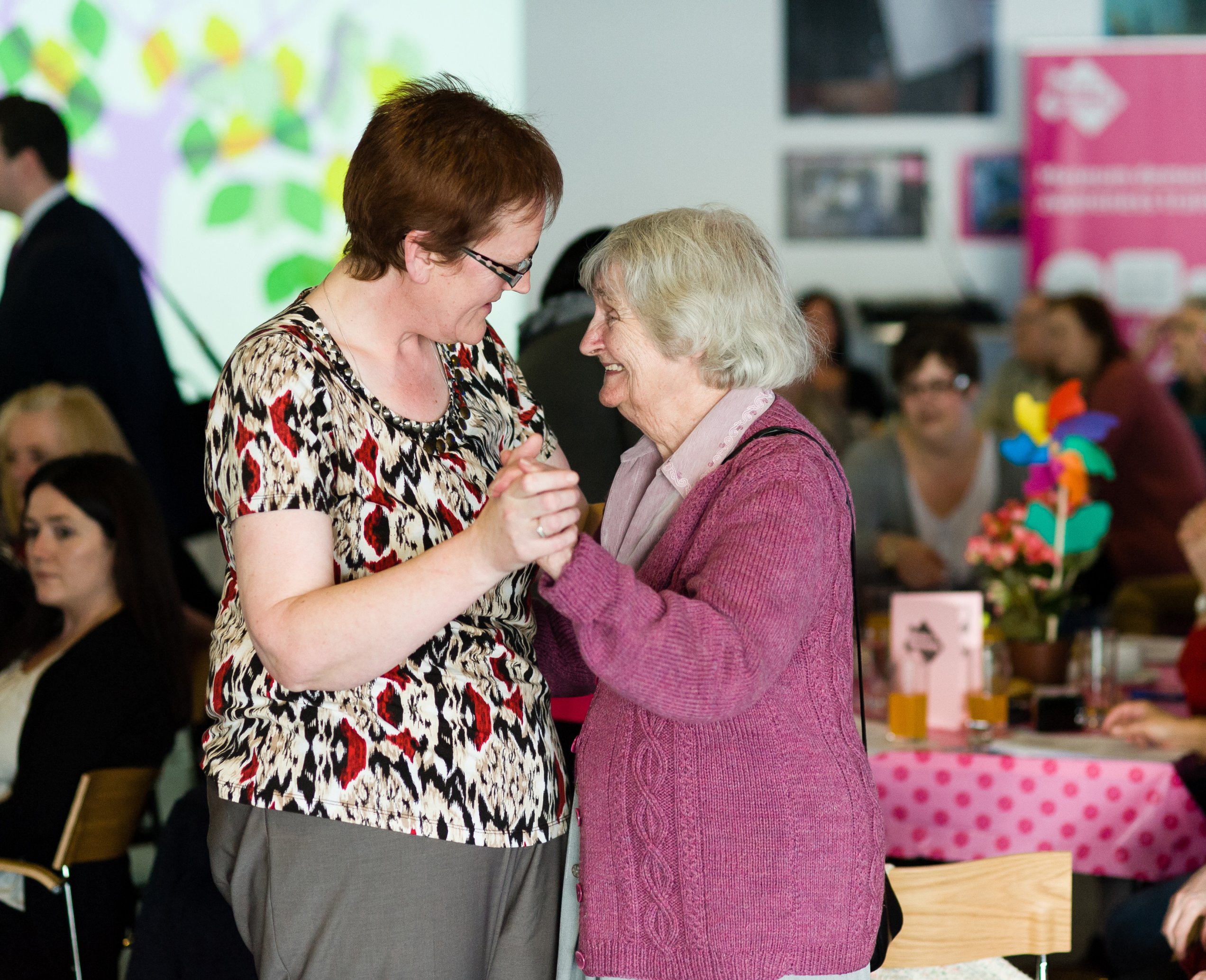 Photo of two women dancing