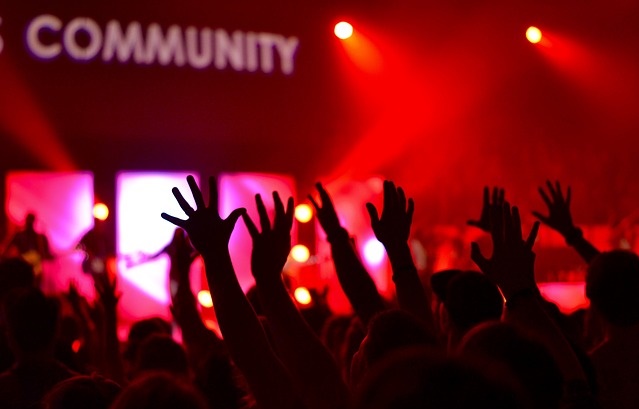 Photo of girls watching show and clapping