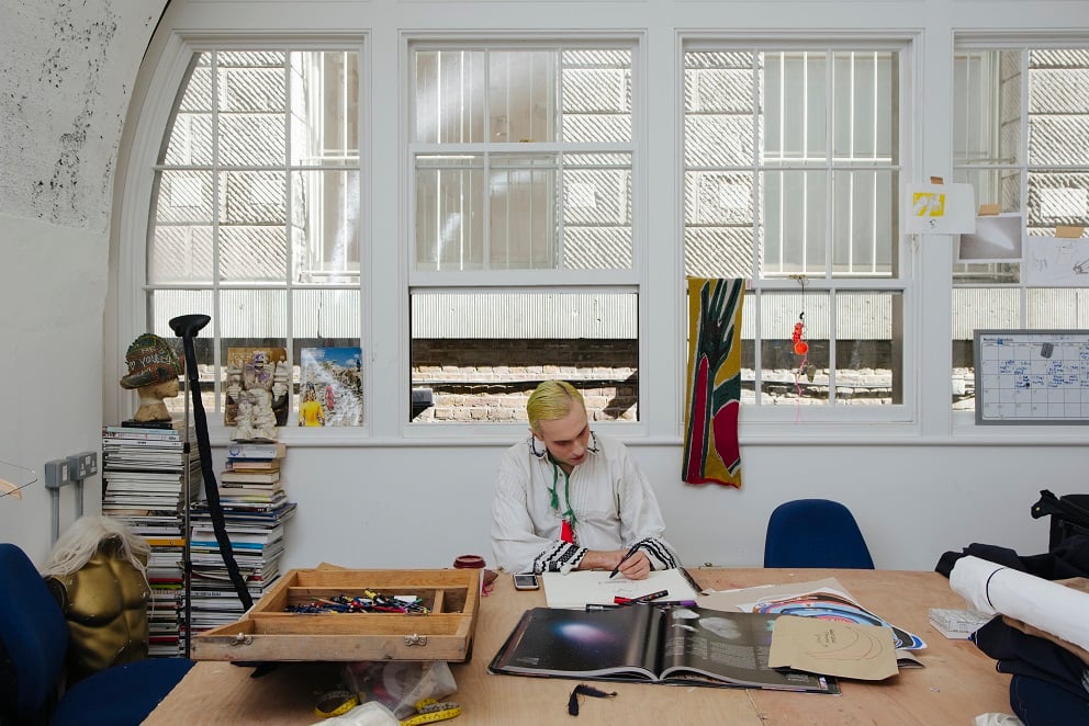 Photo of artist in studio