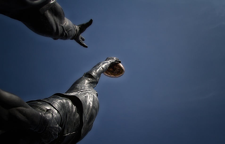 Photo of reaching statues