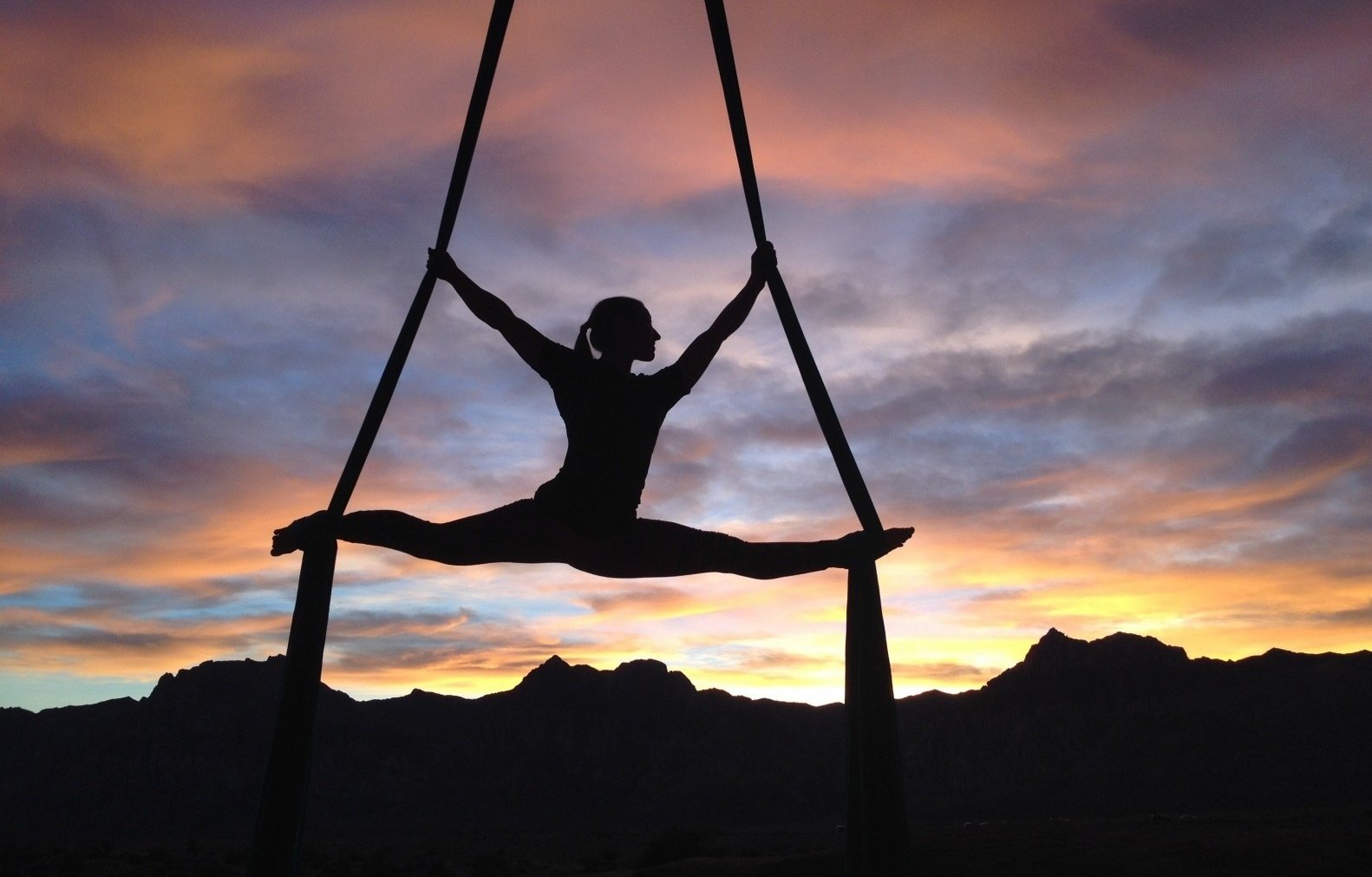 silhouette-of-woman-stretching