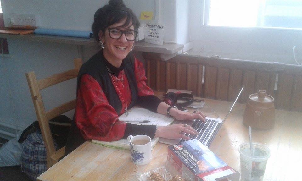 Photo of woman at desk