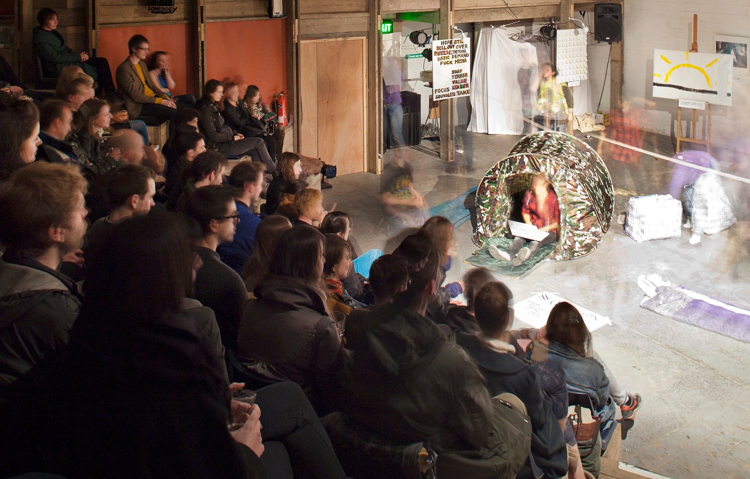 Photo of audience watching performance