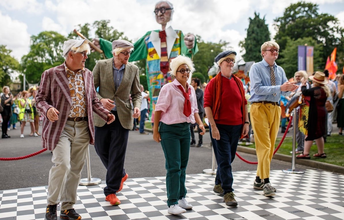 Group of people dressed like David Hockney