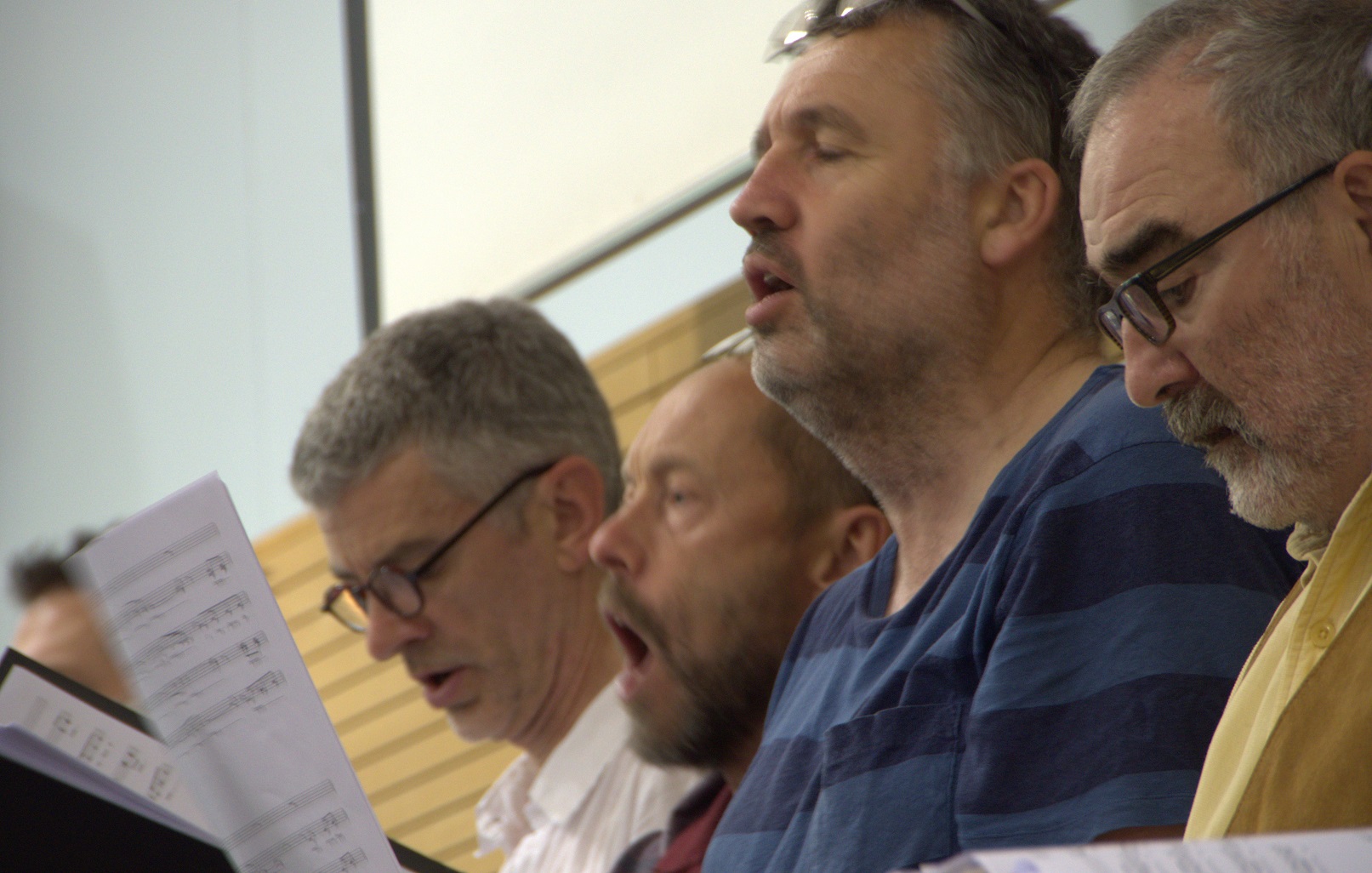 Photo of men singing