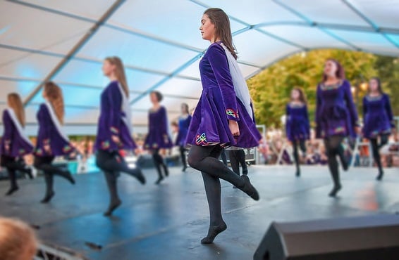 Women dancing on a stage