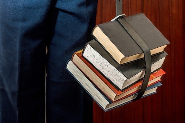 Man carrying books