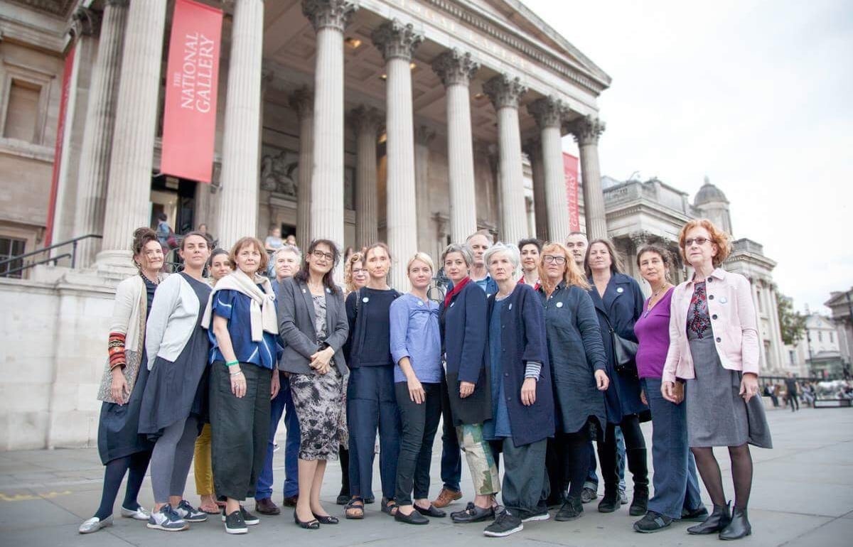 A photograph of people on steps in front of the National Gallery