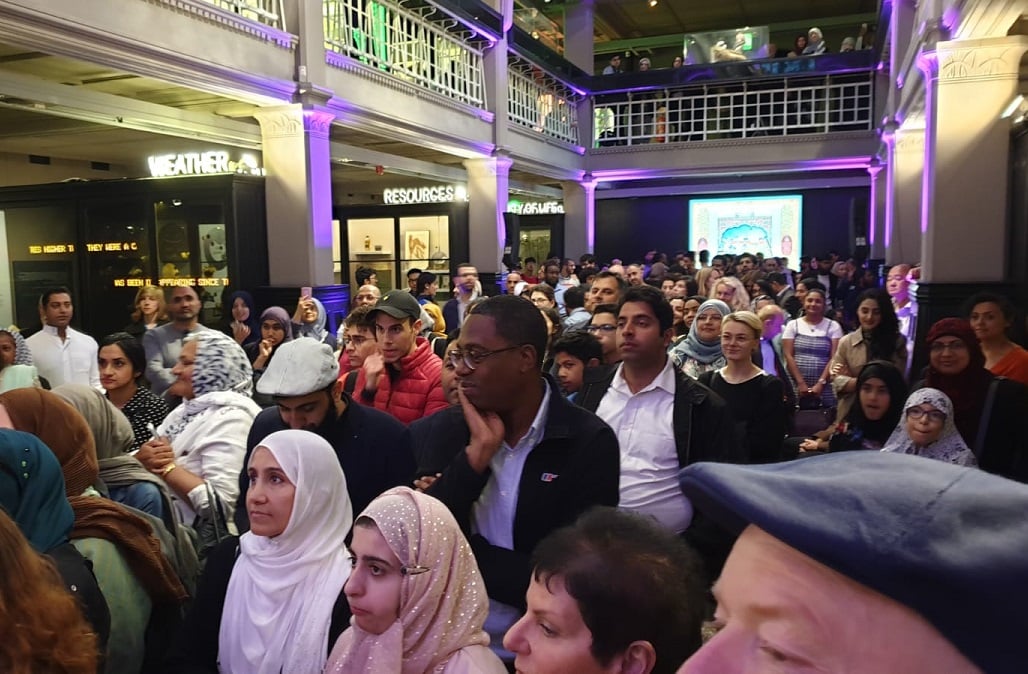 A photo of a group of people at Manchester Museum