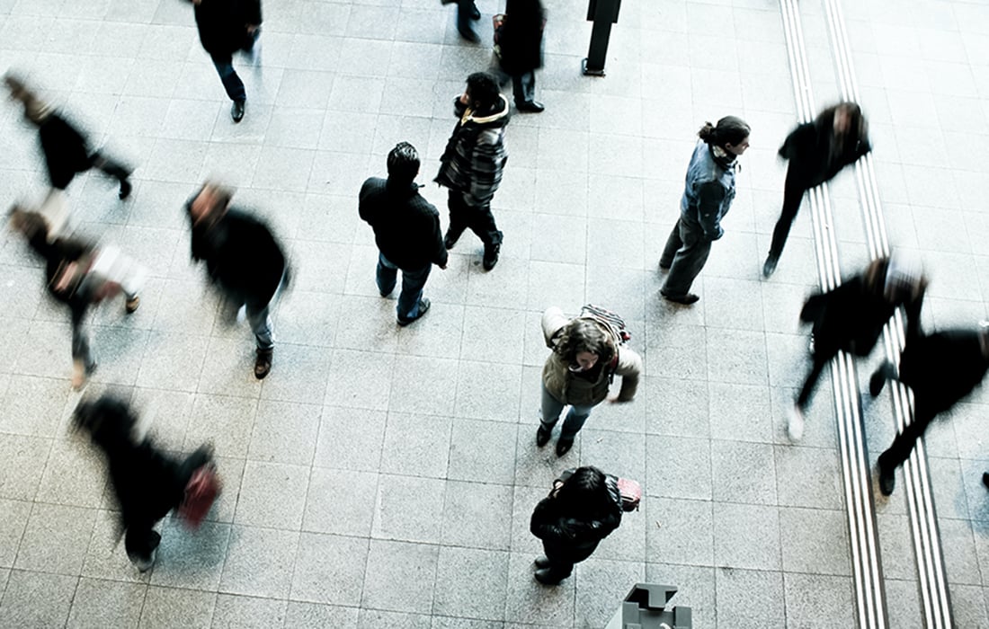 view from above of a group of casually-dressed people standing